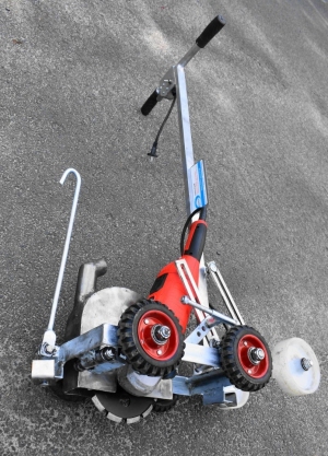 It chamfers expansion joints, widens cracks, and cuts grooves